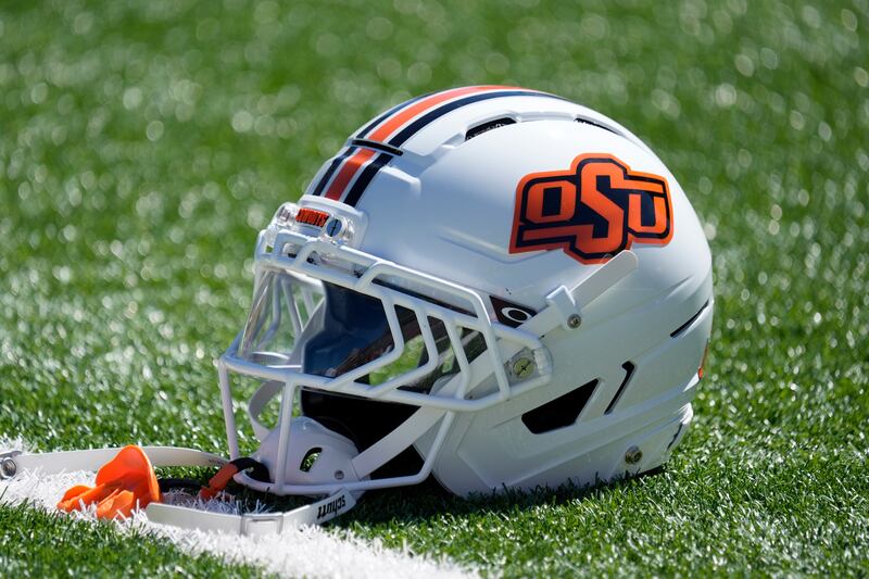 TUCSON, ARIZONA - OCTOBER 04: Oklahoma State Cowboys helment on the field before the game against the Arizona Wildcats at Arizona Stadium on October 04, 2025 in Tucson, Arizona. (Photo by Patrick Mulligan/Getty Images)