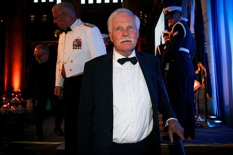 Ted Turner, founder of Cable News Network Inc. (CNN) and chairman of Turner Foundation Inc., leaves the stage during the U.S. Navy Memorial's annual gala at the National Building Museum