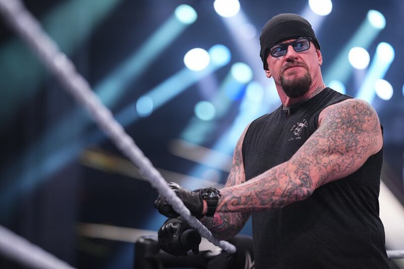 HOUSTON, TEXAS - JULY 22: Undertaker looks on during NXT at 713 Music Hall on July 22, 2025 in Houston, Texas. (Photo by Cooper Neill/WWE via Getty Images)