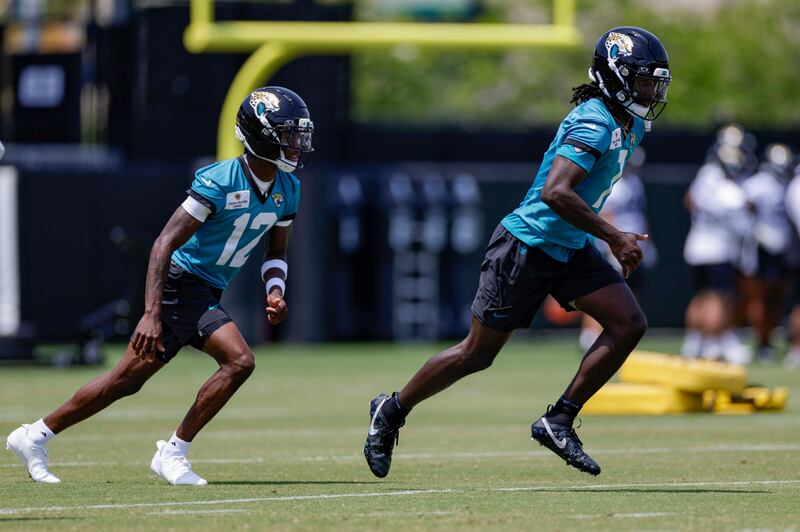 JACKSONVILLE, FL - MAY 19: Jacksonville Jaguars wide receiver Brian Thomas Jr. (7) runs during a drill with Jacksonville Jaguars wide receiver Travis Hunter (12) during the Jacksonville Jaguars OTA on May 19, 2025 at Miller Electric Center in Jacksonville, Fl. (Photo by David Rosenblum/Icon Sportswire via Getty Images)