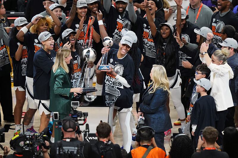 The Las Vegas Aces celebrate winning the WNBA Finals after the game against the Phoenix Mercury during Game 4 of the 2025 WNBA Finals.
