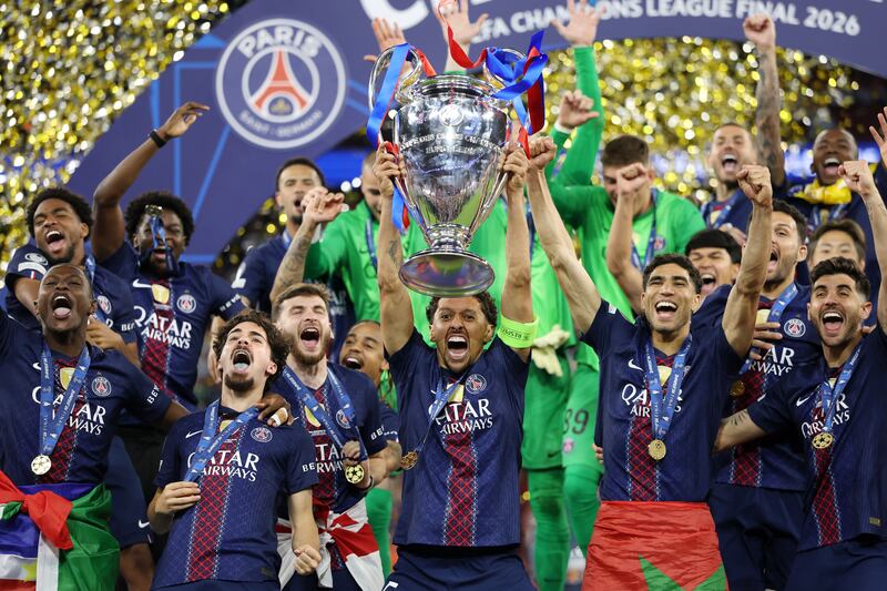 BUDAPEST, HUNGARY - MAY 30: Marquinhos of Paris Saint-Germain lifts the UEFA Champions League trophy after his team's victory in the UEFA Champions League Final 2026 match between Paris Saint-Germain and Arsenal FC at Puskas Arena on May 30, 2026 in Budapest, Hungary. (Photo by Michael Regan - UEFA/UEFA via Getty Images)