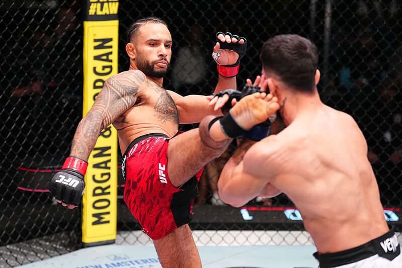 LAS VEGAS, NEVADA - NOVEMBER 01: (L-R) Isaac Dulgarian kicks Yadier del Valle of Cuba in a featherweight fight during the UFC Fight Night event at UFC APEX on November 01, 2025 in Las Vegas, Nevada. (Photo by Chris Unger/Zuffa LLC)