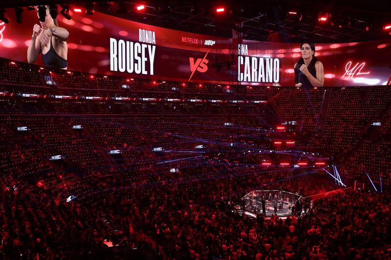 US Mixed Martial Arts (MMA) fighters Ronda Rousey and Gina Carano arrive for their Featherweight Bout at the Intuit Dome in Inglewood, California, on May 16, 2026. (Photo by Patrick T. Fallon / AFP via Getty Images)