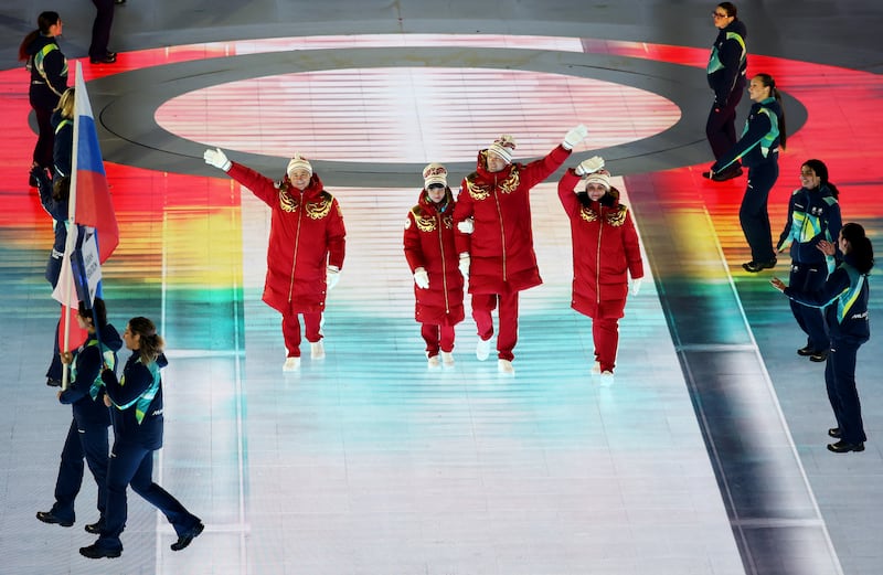 VERONA, ITALY - MARCH 06: Athletes of Team Russia wave as they walk through the stadium during the Milano Cortina 2026 Winter Paralympic Games opening ceremony at Arena di Verona on March 06, 2026 in Verona, Italy. (Photo by Alex Grimm/Getty Images)