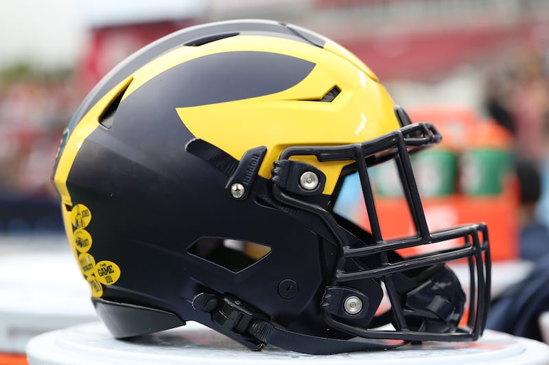 TAMPA, FL - DECEMBER 31: a Michigan Wolverines helmet rests near the sidelines during the ReliaQuest Bowl game between the Michigan Wolverines and the Alabama Crimson Tide on Tuesday, December 31, 2024 at Raymond James Stadium in Tampa, Fla. (Photo by Peter Joneleit/Icon Sportswire via Getty Images)