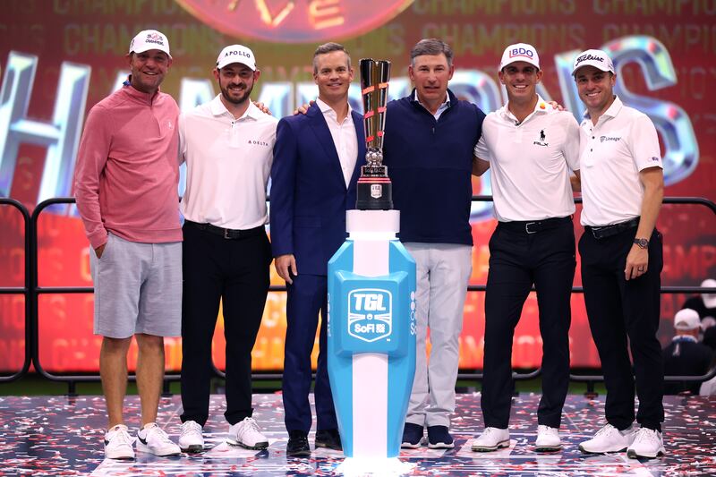 Lucas Glover, Patrick Cantlay, Billy Horschel and Justin Thomas of Atlanta Drive GC pose for a photograph with TGL CEO Mike McCarley and SoFi CEO Anthony Noto after their TGL presented by SoFi match victory