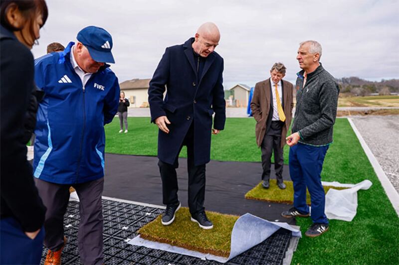 FIFA's Gianni Infantino (c) noted Michigan State and Tennessee researchers have been working on field surface consistency